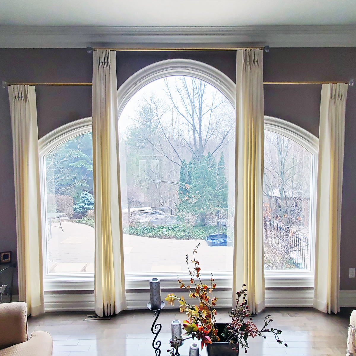 Drapery over arched windows
