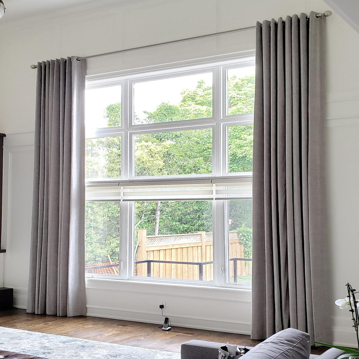 Custom drapery installation in a Toronto home