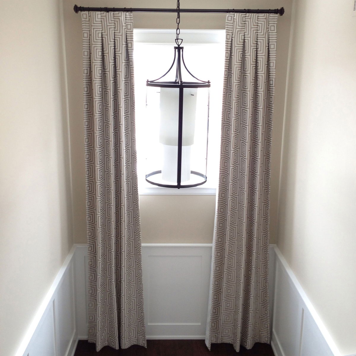 Custom drapery installation very tall